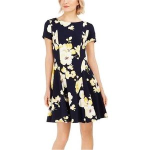 Jessica Howard A Line dress. Navy blue and yellow floral print. Size 12P.